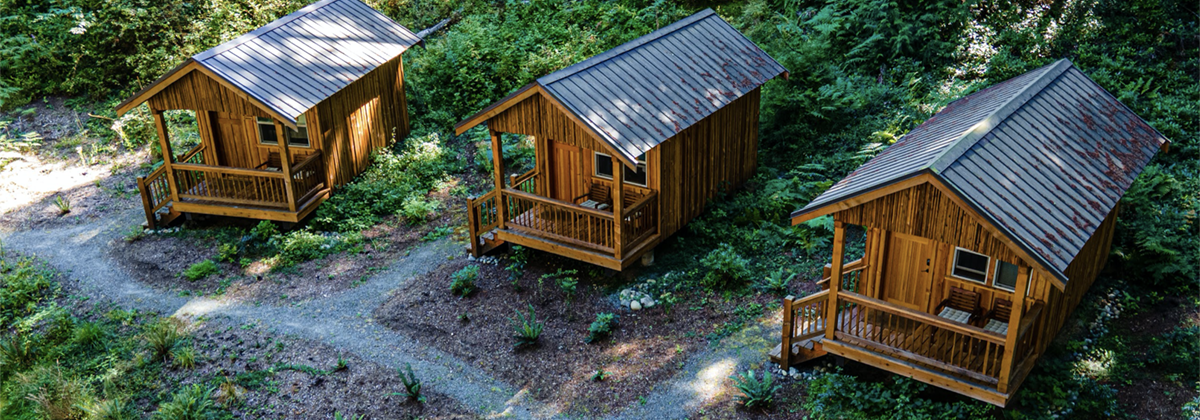 Aerial view of three Hillside Cabins